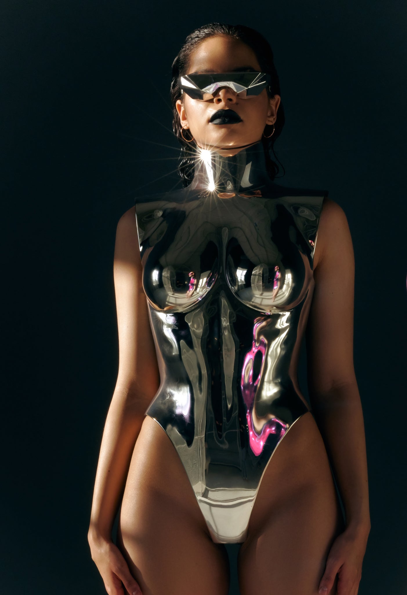 FUTURIST LACQUERED ACRYLIC BREASTPLATE CRAFTED FOR AVANT-GARDE FASHION AND HIGH-END WEARABLE ART COLLECTORS. FEATURES A HIGH GLOSS CHROME FINISH AND PRECISE ANATOMICAL MOLDING. LIGHTWEIGHT YET DURABLE, IDEAL FOR PERFORMANCES, EXHIBITIONS, AND RUNWAY EVENTS BY UTRANOVA.